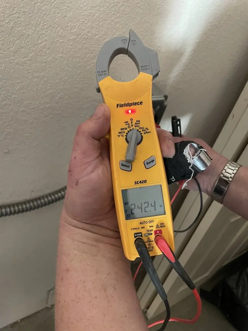 Voltage testing with clamp meter during Hot Tub / Pool Electrical Wiring in Hazlehurst